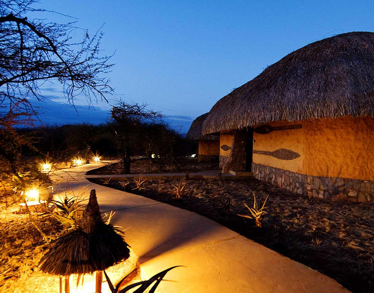Guest cottage at night at Samburu Sopa Lodge