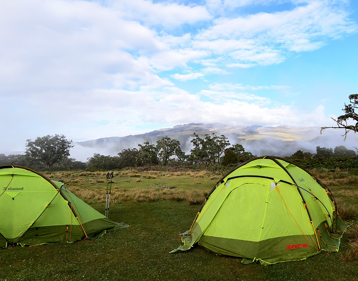Two green mountain tents on Mt Kenya.