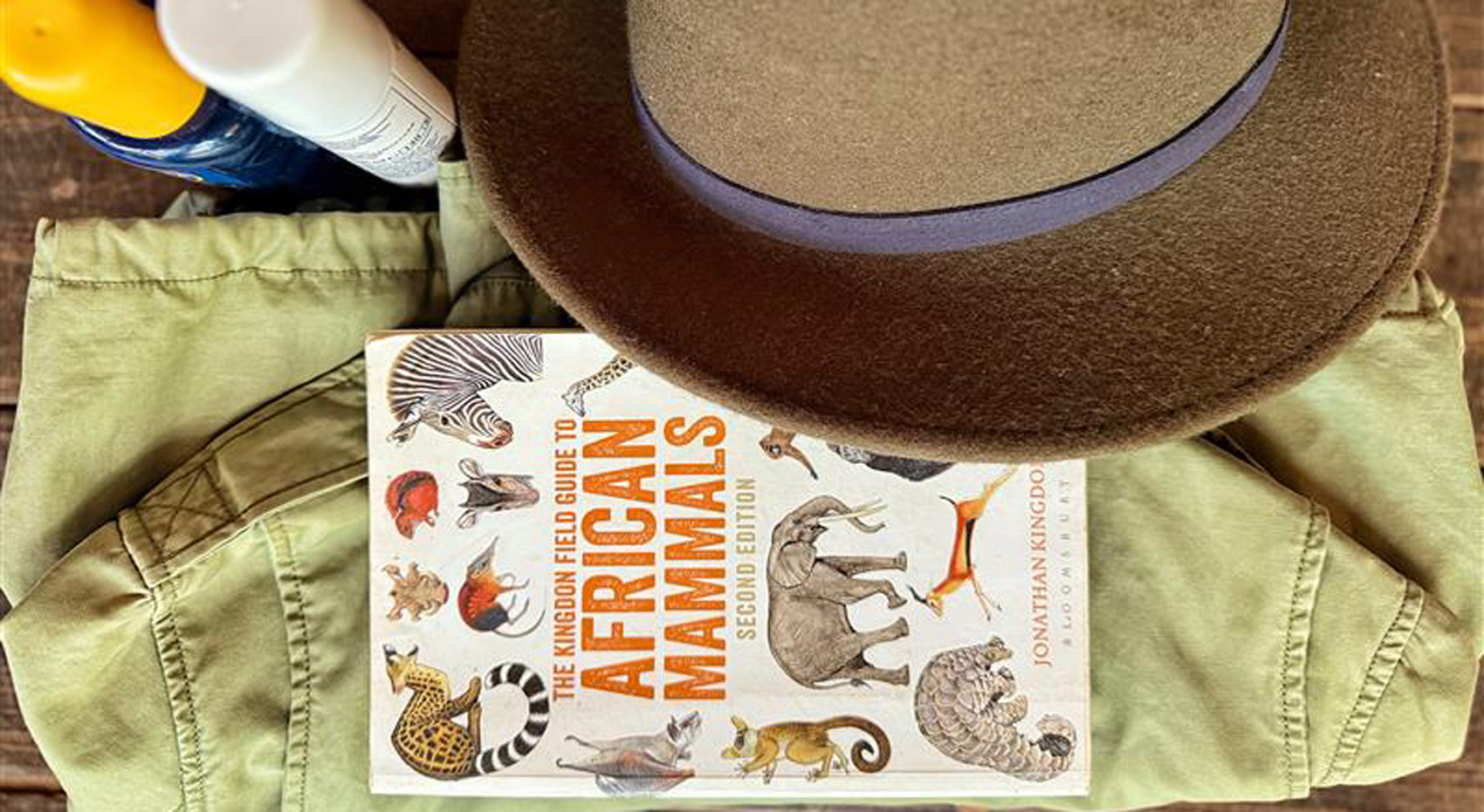 A safari jacket, hat and A safari jacket, hat and