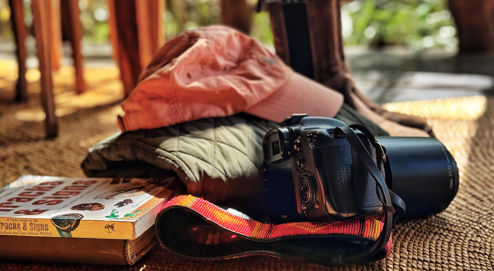 Books, camera, cap and jacket, ideal safari accesories. Books, camera, cap and jacket, ideal safari accesories.