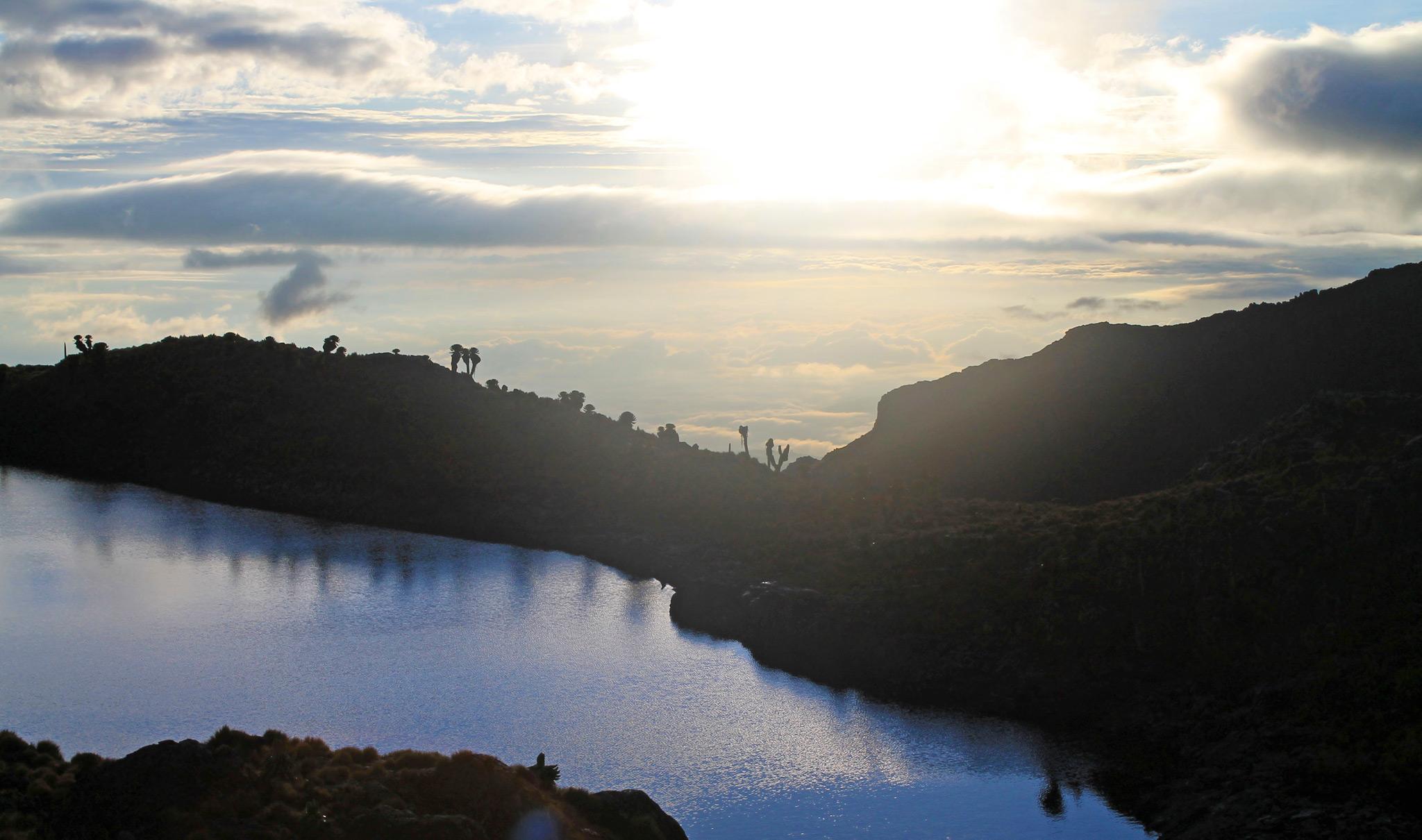 A Mt Kenya landscape with a lake above the clouds.
