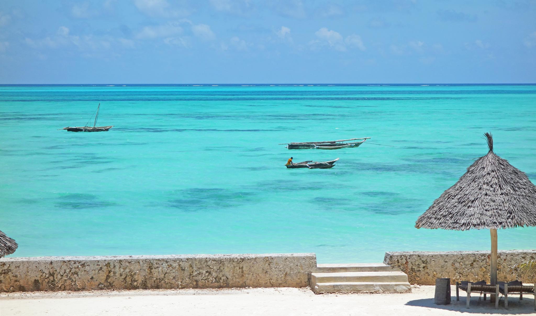 The East African coastline enchants with its pristine waters, white sandy beaches, and a timeless sense of tropical tranquility.