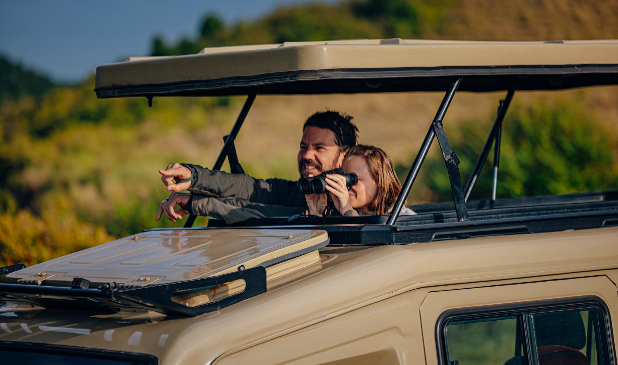 Guests in a Kenya-Experience game drive vehicle.