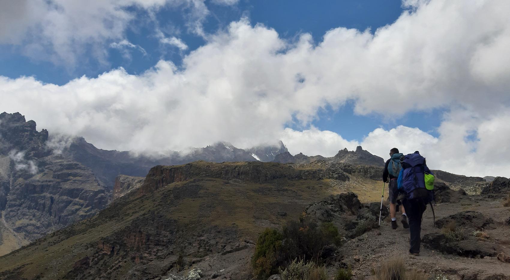 Hikers on the alpine desert tracks of Mount Kenya.