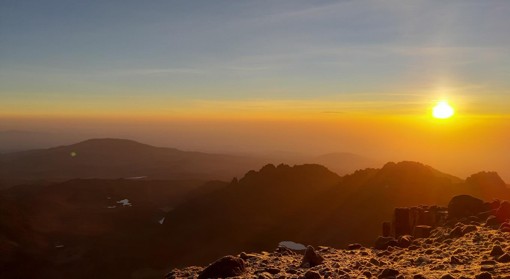 A landscape photo of the views of point Lenana at sunrise.