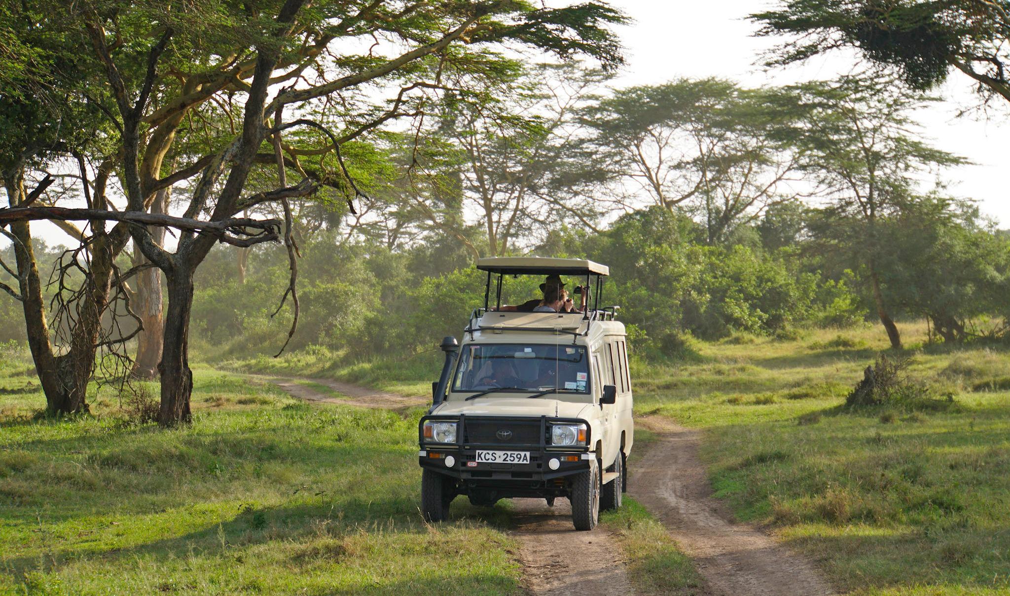 A vehicle with guests in it at Solio Ranch.